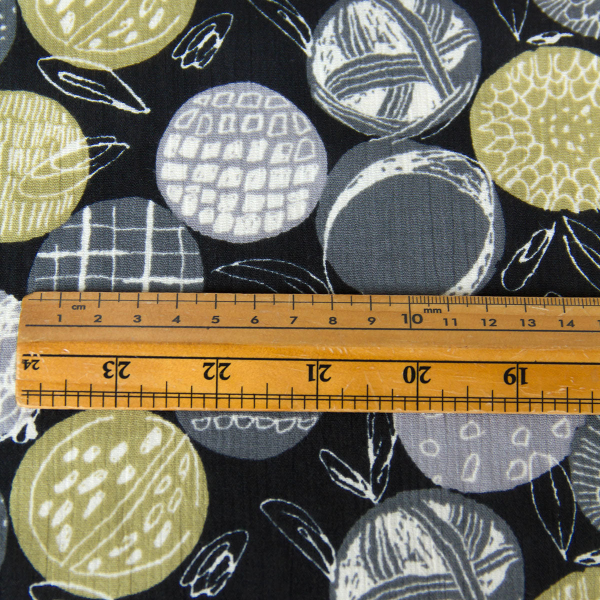 Lightweight Crinkled Gauze with Geometric Circle Pattern Black by the Yard