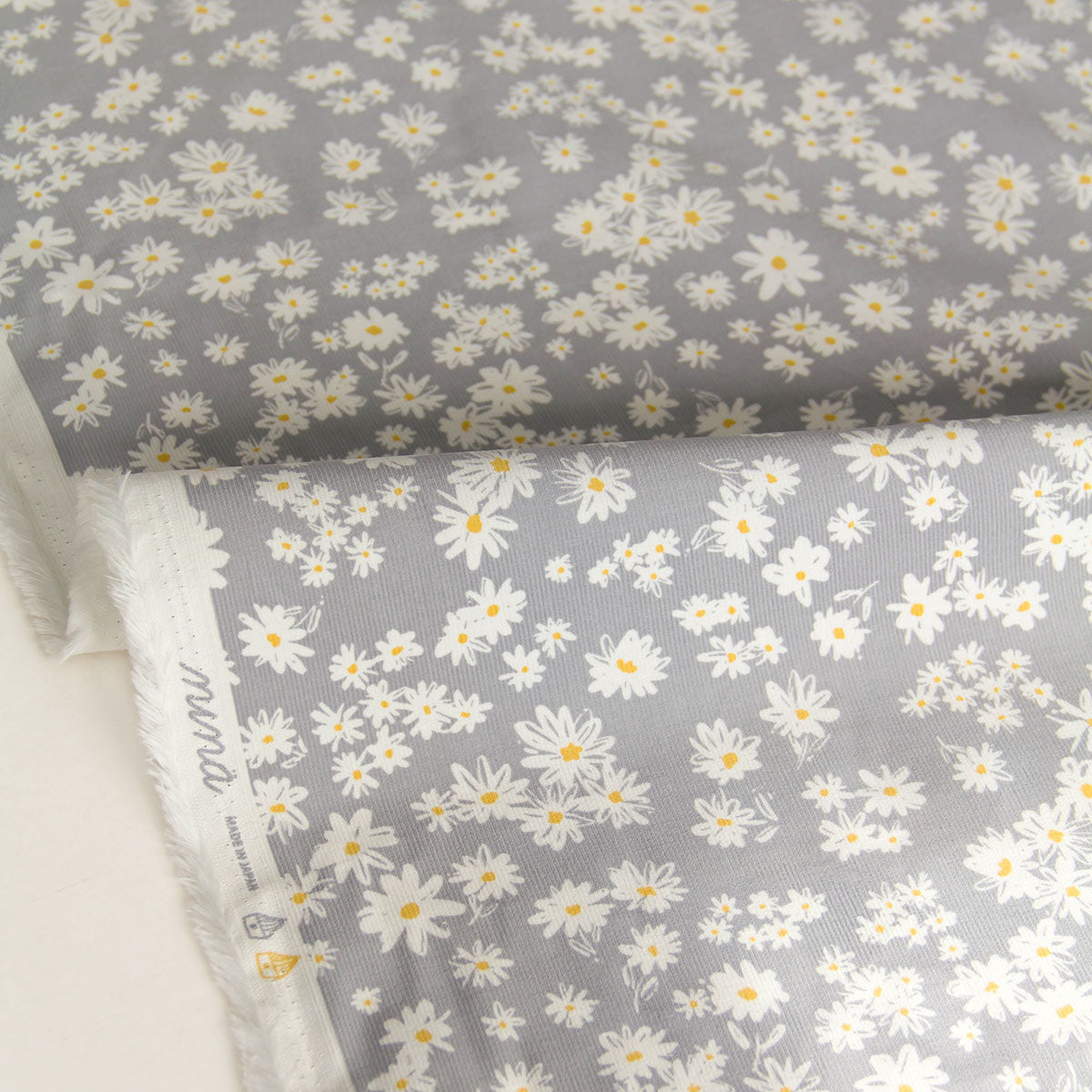 21 Wale Corduroy with White Daisy Print Grey by the Yard