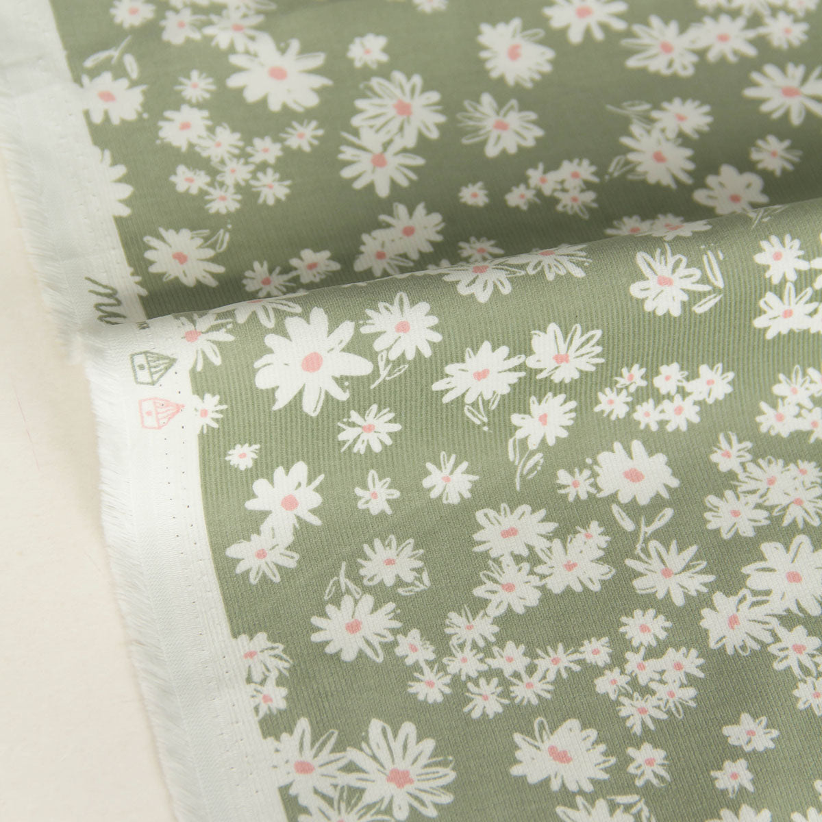 21 Wale Corduroy with White Daisy Print Light Olive by the Yard