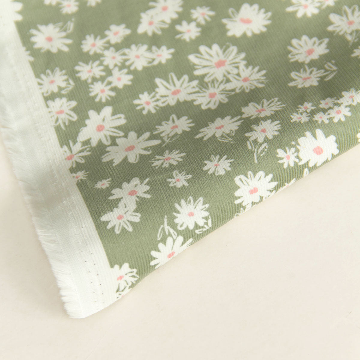 21 Wale Corduroy with White Daisy Print Light Olive by the Yard
